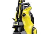 a yellow pressurer with a hose attached to it