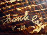 a picture of a picture of a guitar with writing on it