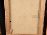 an old wooden easel with a painting on top of it