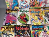 a lot of comic books that are on the table