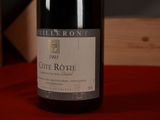 a bottle of wine that is sitting on a table
