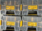 several plastic storage boxes are stacked on top of each other