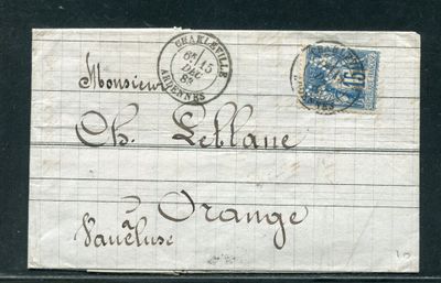 an old envelope with a stamp on it with writing on it