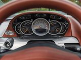 a close up of a steering wheel and dashboard of a car