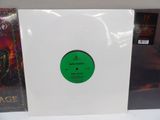 an image of a picture of a white album with a green label on it