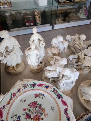 a lot of figurines that are on the table