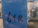 a blue parking meter with a smiley face on it