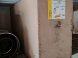 a box that is sitting on a shelf in a room
