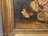 a painting of flowers in a vase on a table
