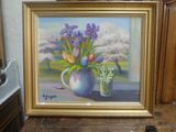 un tableau représentant des fleurs dans un vase, à côté d'un vase rempli de fleurs