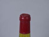 a bottle of wine that is sitting on a table