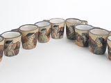 a group of cups that are sitting on a table