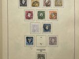 an open book with a picture of different stamps on it