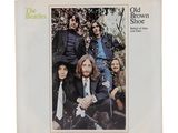 an old brown album with a picture of the beatles