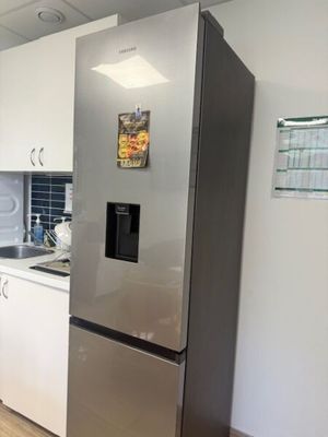 an image of a modern kitchen with stainless steel appliances