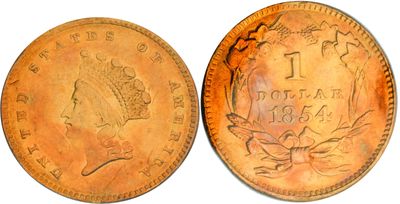 a close up of two coins on a white surface