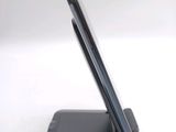 a cell phone that is sitting on top of a stand