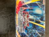 a close up of a box of pokemon trading cards on a table