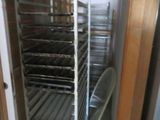 an image of a rack of food in a kitchen