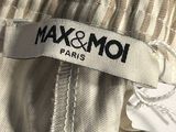a close up of a label on a white pants
