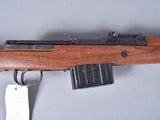 an image of a rifle with a magazine attached to it ' s side