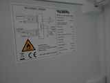 a picture of a sign on the side of a refrigerator