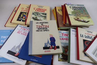 un grand nombre de livres posés sur une table