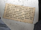 a piece of paper on the back of a motorcycle