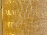 a close up of a book with writing on it