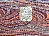 a close up of a book cover with a pattern on it