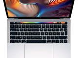 un MacBook Pro d'Apple équipé d'un clavier Retina et d'une Touch Bar