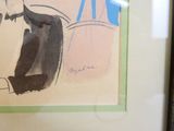 un dessin représentant un homme assis à une table