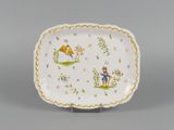 an image of a plate with a boy and a girl on it