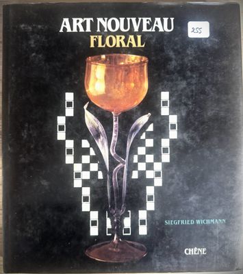 the cover of the book art nouveau floral, with a glass of wine