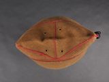 an image of a brown hat with red stitching