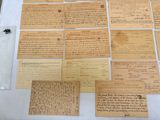 many old papers on display on a table