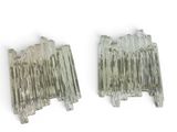 pair of glass sconces on a white background
