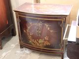a cabinet that has been painted with flowers on it