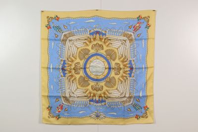 an image of a blue and yellow scarf hanging on a wall