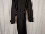the coat is black and has a belt on it