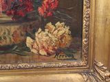 a painting of flowers in a vase on a table