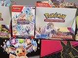several different pokemon cards are stacked on top of each other