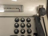 a cash machine that has a lot of buttons on it