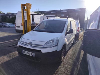 a white van that is parked in a parking lot