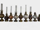 many different types of vases lined up on a white surface