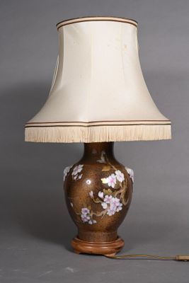 an image of a lamp with a brown base and a white shade
