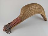 an image of a wooden paddle with a handle on a white background