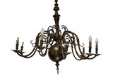 a large brass chandelier with five arms and five lights