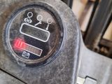 a close up of a control panel on a forklift