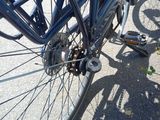 a close up of a bicycle with a broken front wheel